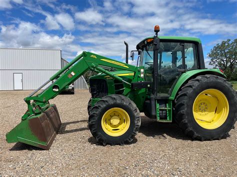 The John Deere 6430 tractor working in the field
