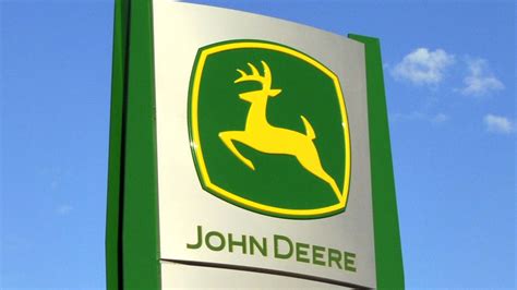 logo John Deere, New Holland i Fendt
