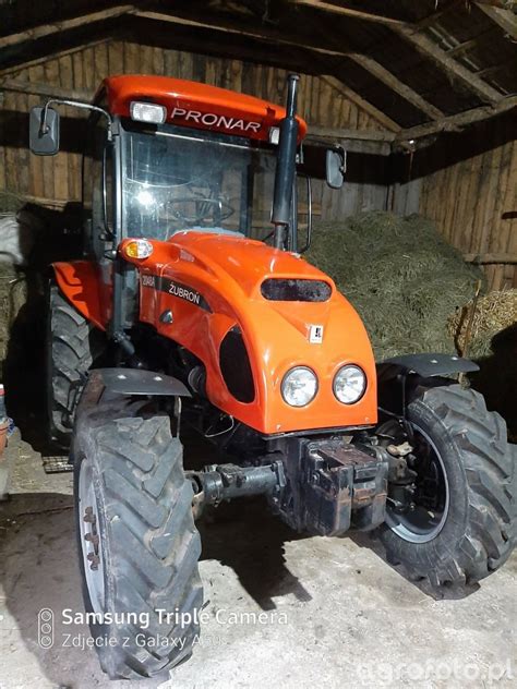 Thematic photo of a Pronar Żubroń tractor with focus on the cabin and windows.