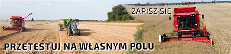 Zdjęcie ciężkiego kombajnu na polu po żniwach, z widocznymi śladami kół