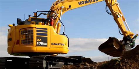 Thematic photo of a Komatsu PC138 excavator working on a construction site