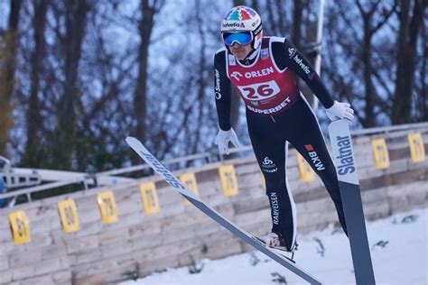 zdjęcie Simona Ammanna świętującego jedno ze swoich olimpijskich zwycięstw