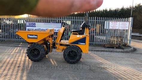 Thematic photo of a Thwaites 1T miniloader at work on a construction site