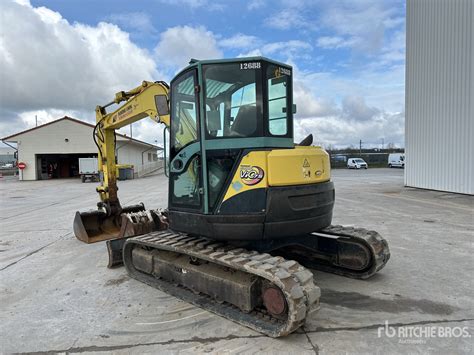 Schemat budowy hydromotoru Yanmar VIO75-A SO-TM-09 z zaznaczonymi punktami kontroli oleju
