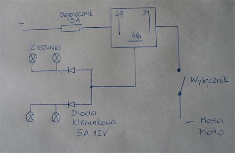 Schemat ideowy instalacji kierunkowskazów w ciągniku: przerywacz, przełącznik świateł, żarówki oraz kontrolki