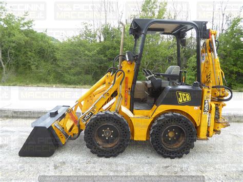 porównanie koparko-ładowarek JCB 1CX i 2CX