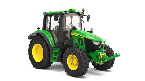 Rear axle and large tires of a John Deere 6M series tractor, emphasizing the improvements in load capacity and tire options.